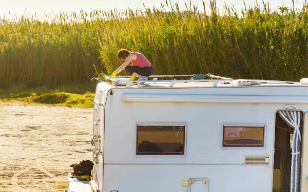 Women learning caravan cleaning tips