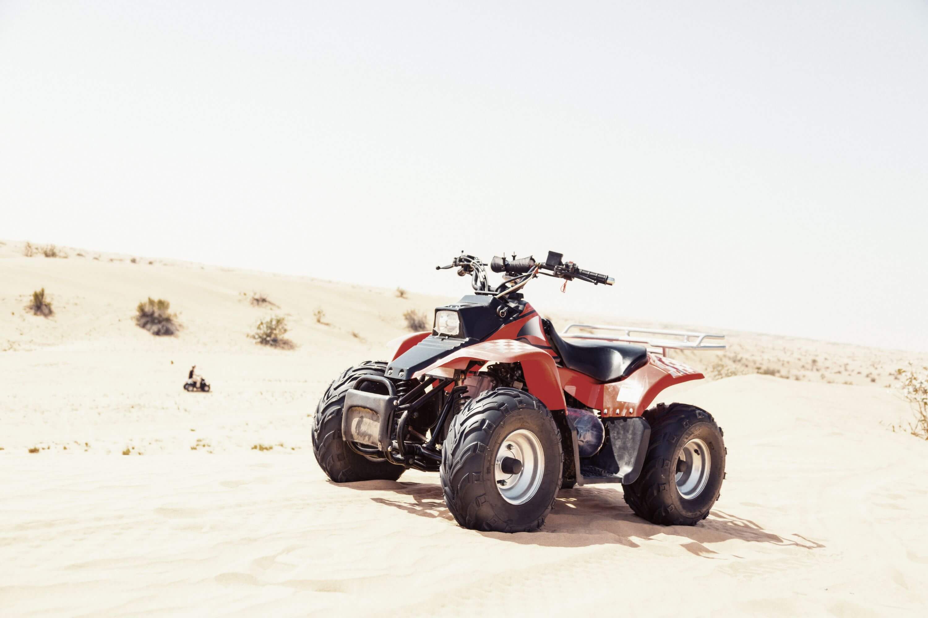 a person quad biking in Lancelin sand dunes